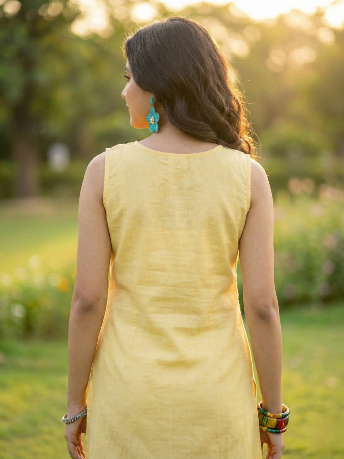 Lemon Yellow Cotton Blend Yoke Embriodery Sleeveless Kurta With Tassles and Kodi