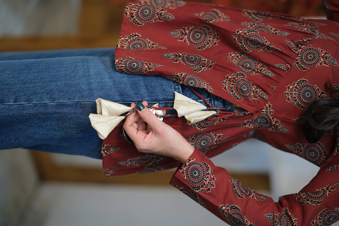 Rust Cotton Blend Printed Alia Cut Peplum short kurti With Tassles and Kodi