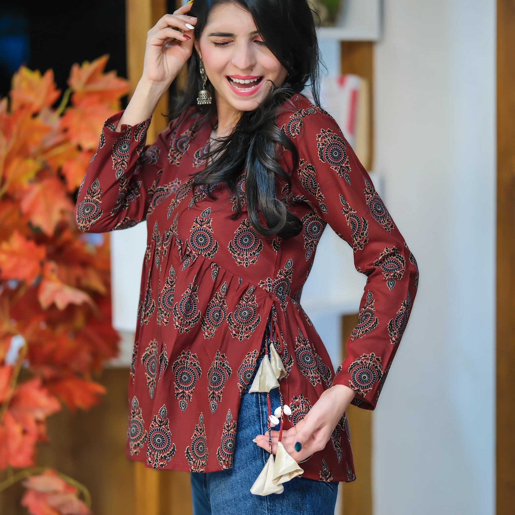 Rust Cotton Blend Printed Alia Cut Peplum short kurti With Tassles and Kodi