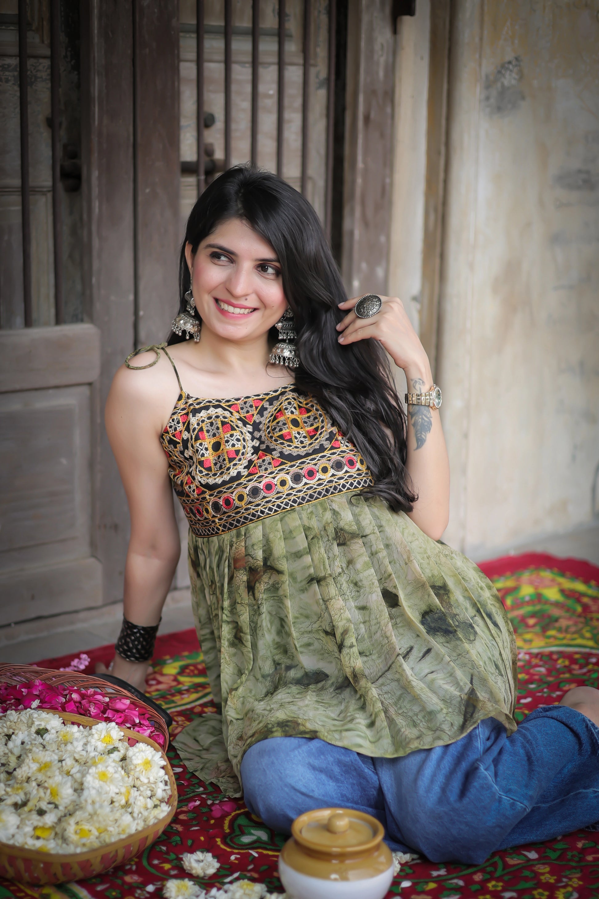 Green georgette embroidered shoulder knot flared short kurti — front view | Youthnic
