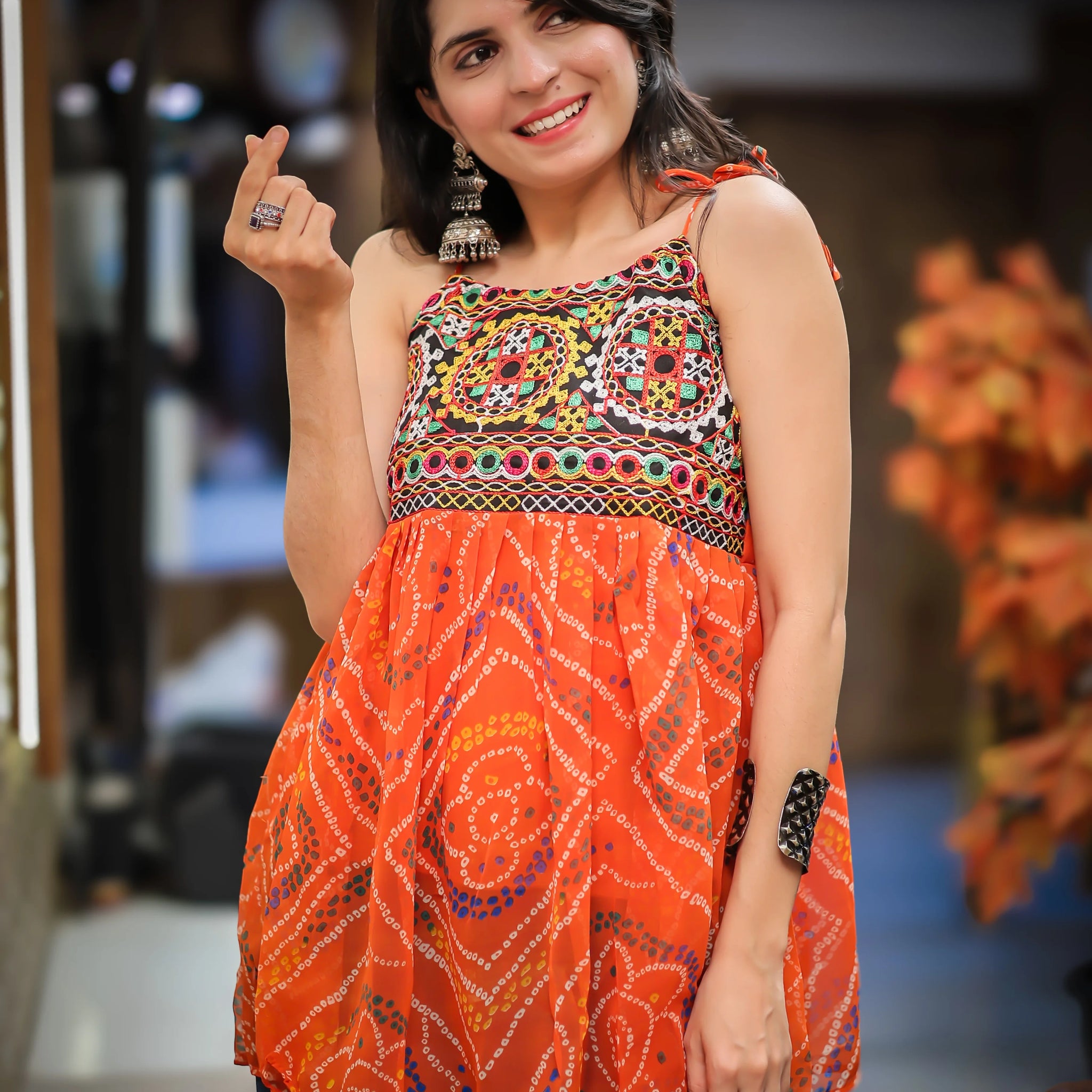 Orange Georgette Bandhani Shoulder Knot Flared Short Kurti