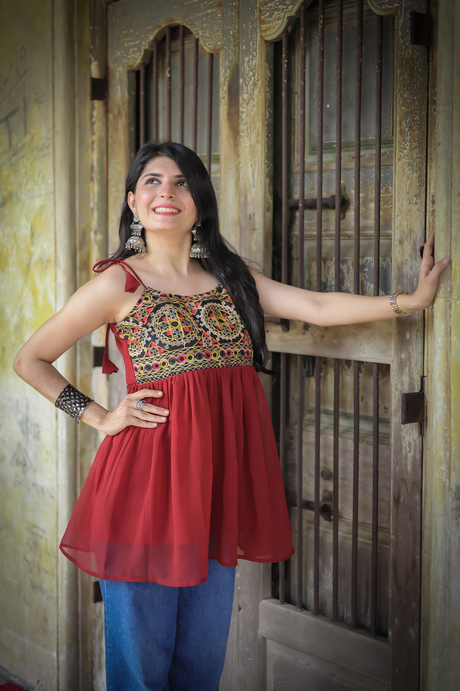 Rust georgette shoulder knot kurti — A-line flare detail | Youthnic