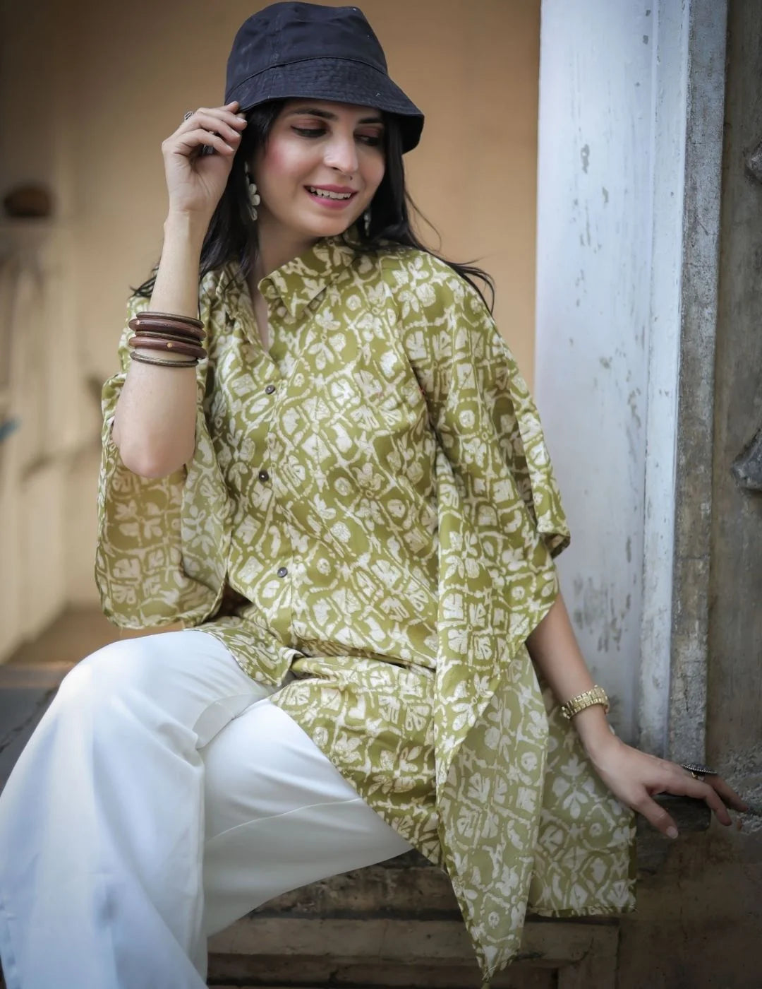 Green Bandhej kaftan top — styled with jeans | Youthnic